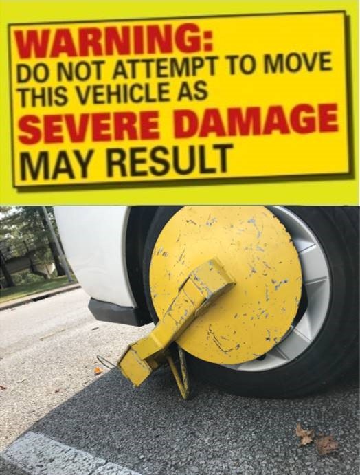"Warning: Do not attempt to move this vehicle as severe damage may result sticker" and parking boot